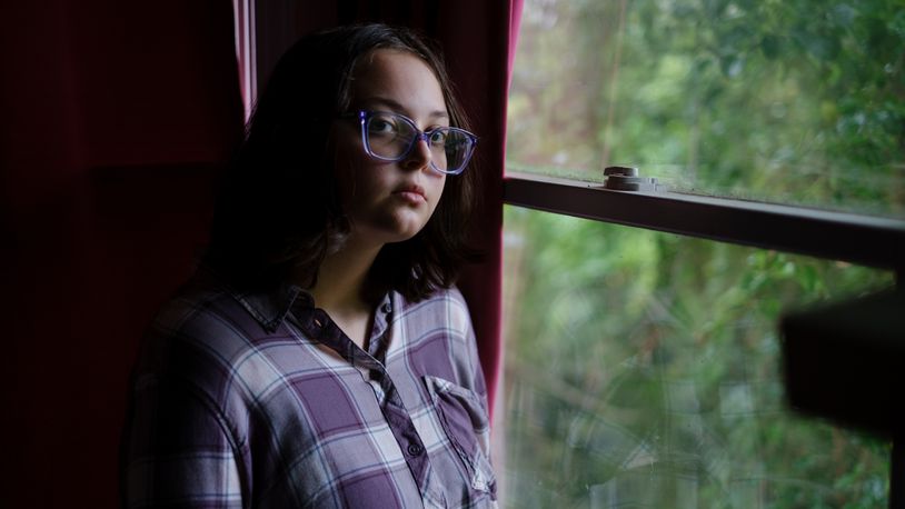 Latha Wright, a 16-year-old Atlanta student, says mental health is misunderstood. She posed for a portrait in her home on May 25, 2022. ©Arvin Temkar/AJC