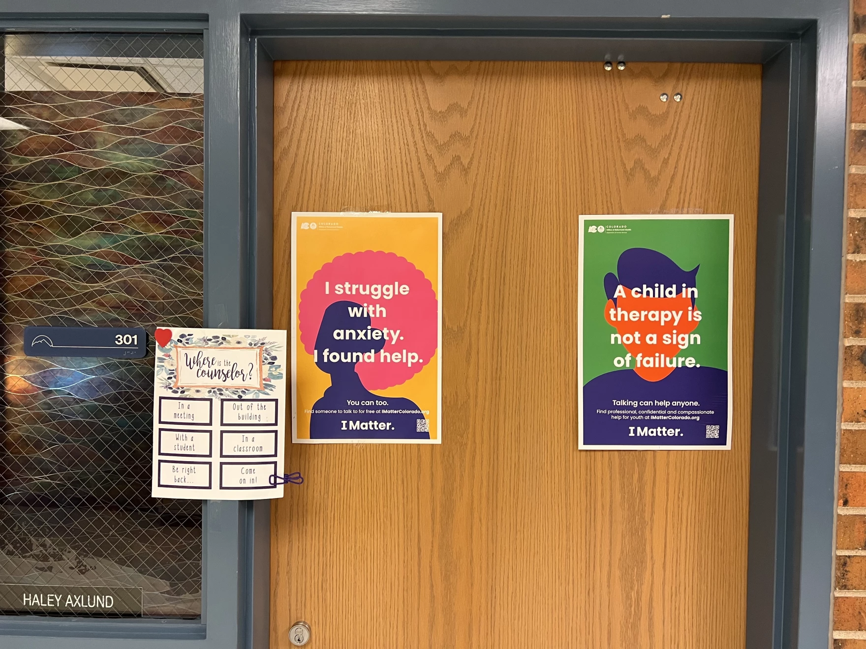 Posters for I Matter, the state's free student therapy program hang in Fort Collins High School. The initiative was launched in 2021, in response to a significant increase in youth mental health needs in Colorado.  ©Leigh Paterson/KUNC