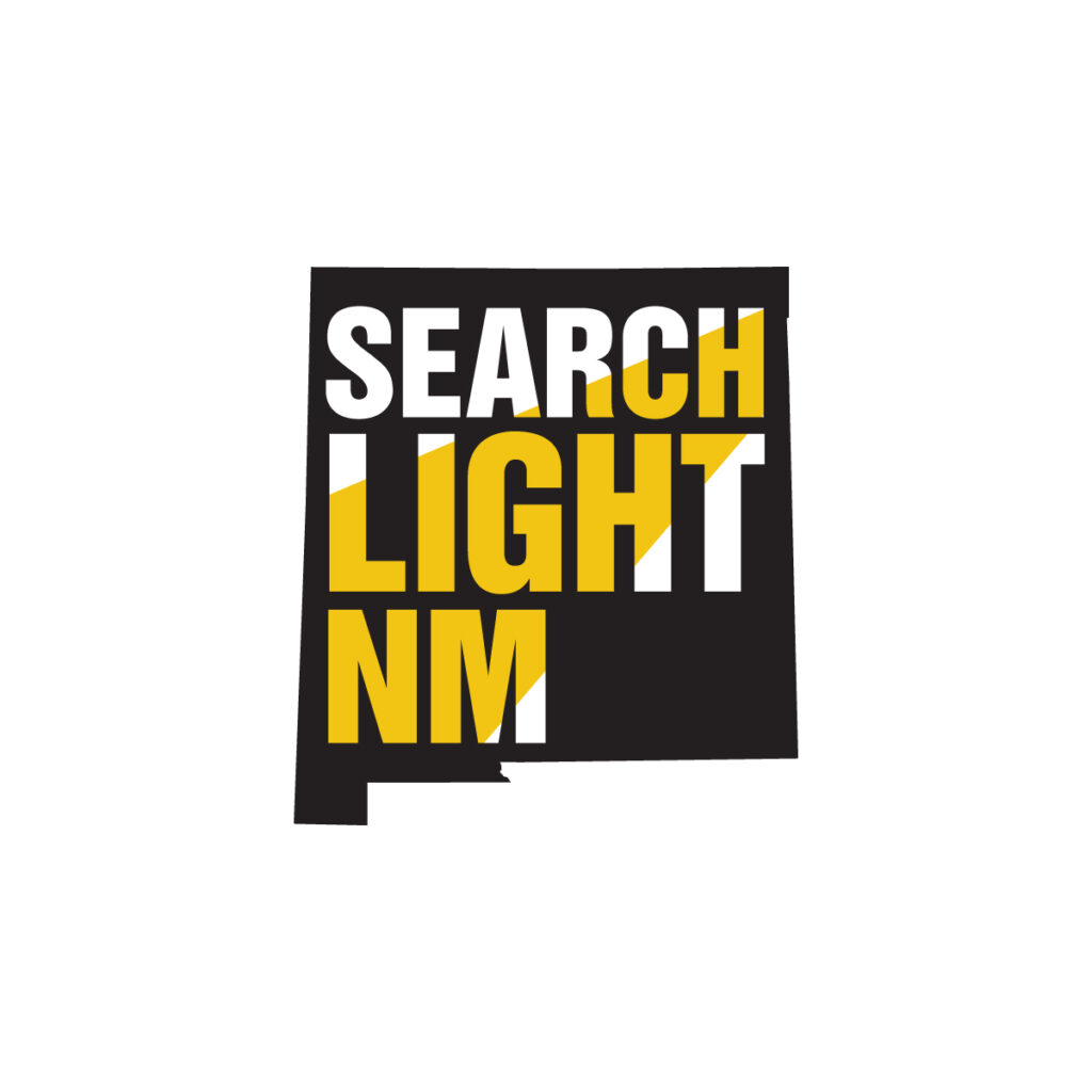 Searchlight New Mexico logo