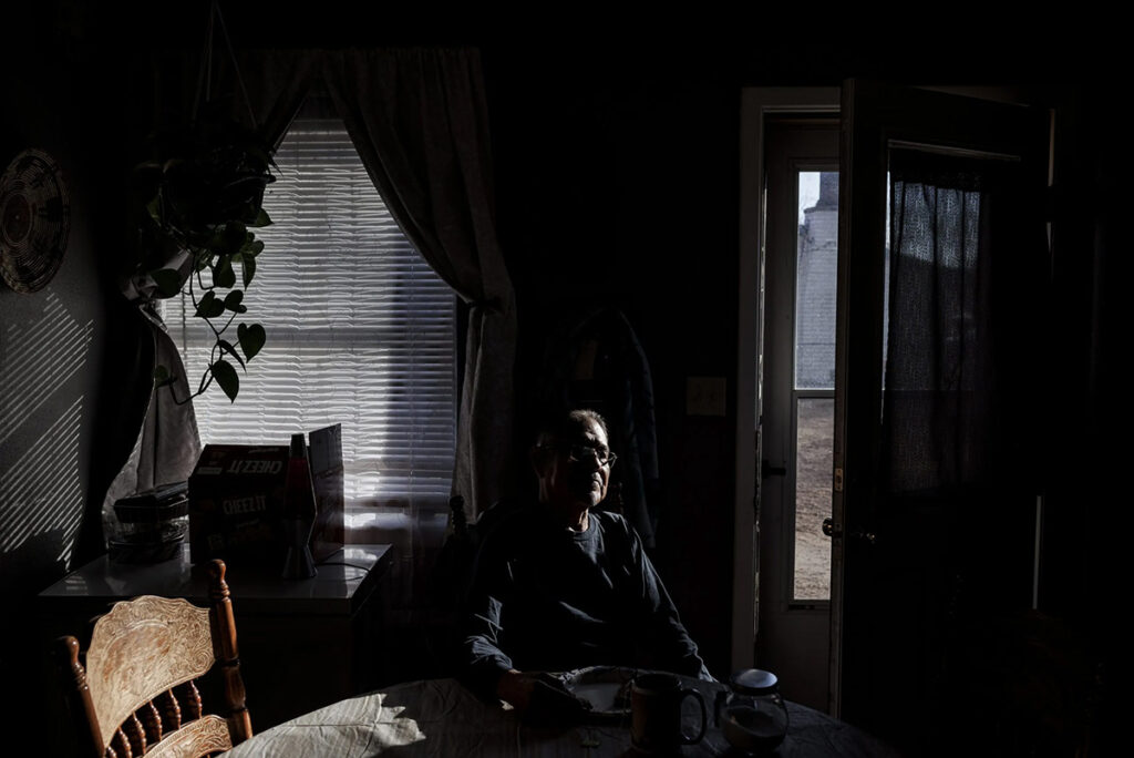 Anders Hustito sits at his house in Zuni Pueblo, New Mexico. His son, 43-year-old Jeffrey Hustito, died at a sober living home in Glendale, Arizona, in 2022. © Adriana Zehbrauskas, special to ProPublica