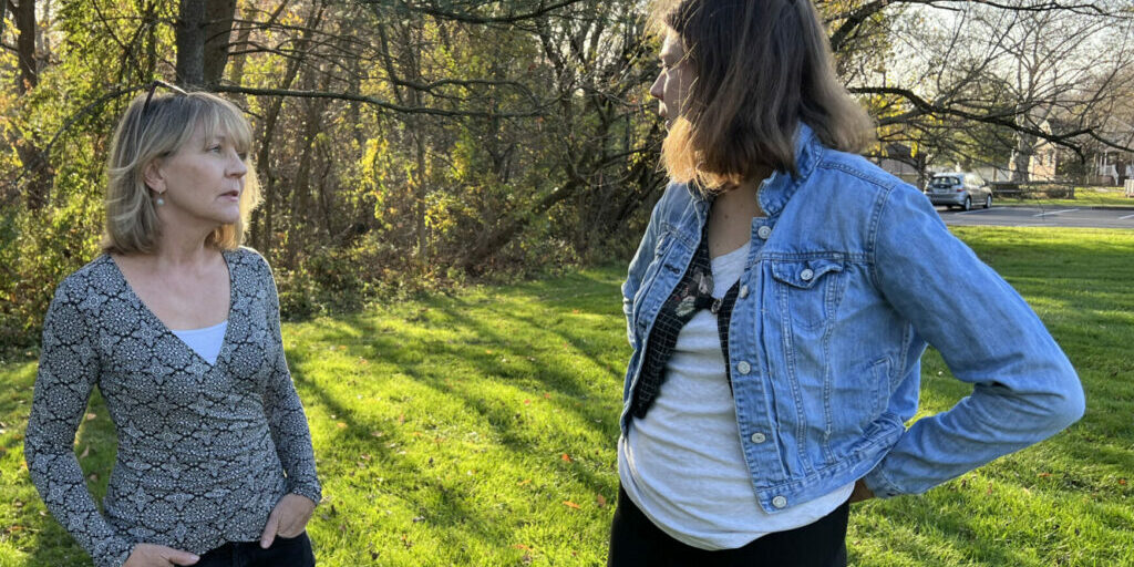 ©WITF: Martha Stringer, at left, talks with her daughter Kimberly Stringer, at right. The Stringers have filed a lawsuit against Bucks County Correctional Facility employees after Kimberly was pepper-sprayed and restrained while detained there while suffering from a mental health condition.
