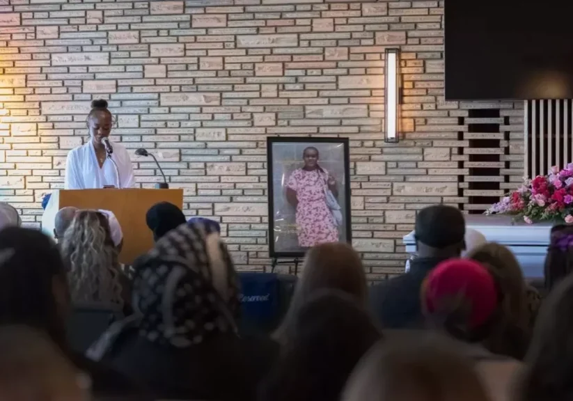 Asha Joseph spoke at her 12-year-old sister's funeral on Tuesday. Sarah Niyimbona had been receiving psychiatric treatment at Providence Sacred Heart Medical Center intermittently for eight months when she died by suicide at the hospital. Erick Doxey/InvestigateWest
