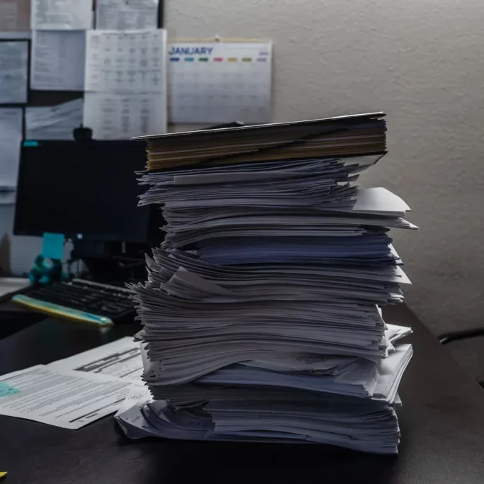 ©Ariana Drehsler/A portion of a stack of 2022 phone screens sit on the desk of Program Manager Darlene Jackson at the McAlister Institute's Adult Detox in Lemon Grove.